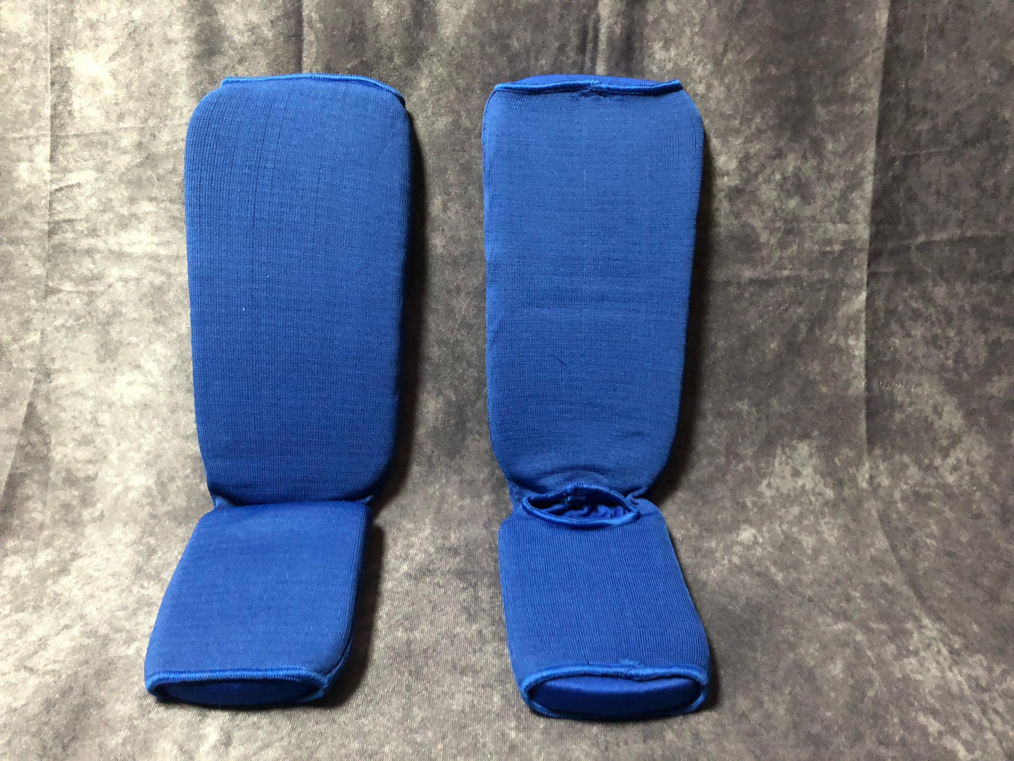 Blauer Schienbein- und Spannschoner von PHOENIX